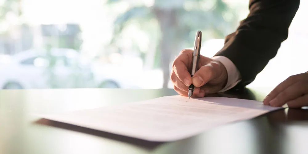 M&A deal contract being signed